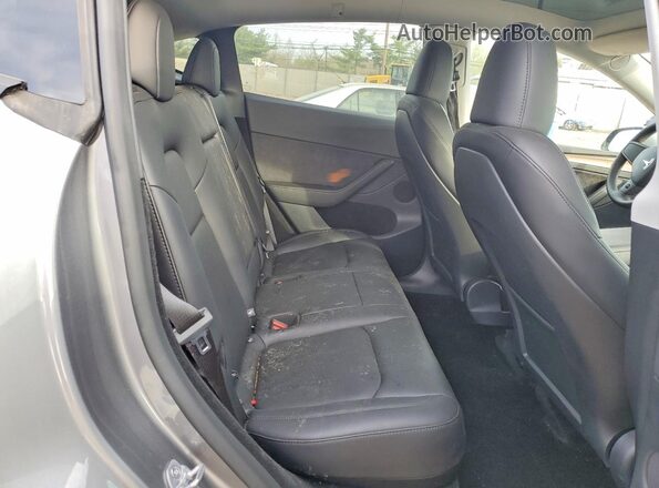 7SAYGDED8SF255309 2025 TESLA MODEL Gray Вид задньої частини салону