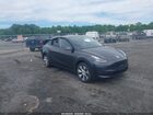 2024 Tesla Model Y   Gray vin: 7SAYGDED9RF017950