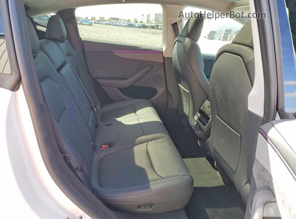 7SAYGDED9TA459180 2026 TESLA MODEL White Rear seats view