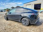 2026 Tesla Model Y Black vin: 7SAYGDEDXTA437348