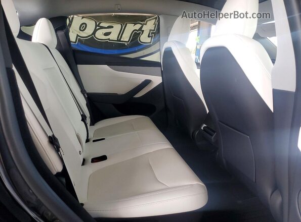 7SAYGDEDXTF530695 2026 TESLA MODEL Gray Vista de los asientos traseros