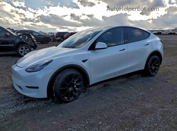 7SAYGDEE0NA018310 2022 TESLA MODEL White წინა მარცხენა ხედი სამი მეოთხედიდან