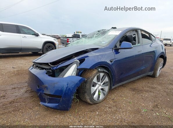 7SAYGDEE0PA040021 2023 TESLA MODEL Y Blue Առջևի ձախ երեք քառորդ տեսարան
