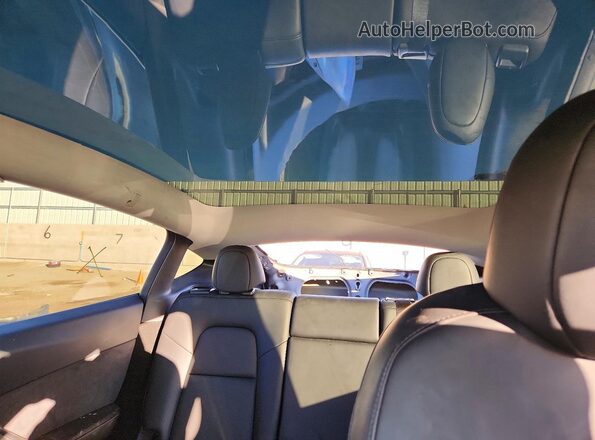 7SAYGDEE0PA123285 2023 TESLA MODEL Gray Widok tylnych siedzeń