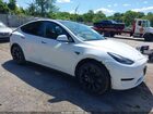 2023 Tesla Model Y Awd/long Range Dual Motor All-wheel Drive Белый vin: 7SAYGDEE0PF598499