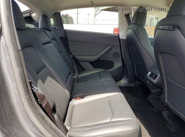 7SAYGDEE0RA217220 2024 TESLA MODEL Gray Rear interior view