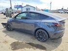 2024 Tesla Model Y Gray vin: 7SAYGDEE0RA217220