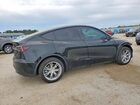 2024 Tesla Model Y Black vin: 7SAYGDEE0RA221963