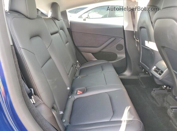 7SAYGDEE0RF198140 2024 TESLA MODEL Blue Vista interior trasera