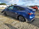 2024 Tesla Model Y Blue vin: 7SAYGDEE0RF198140