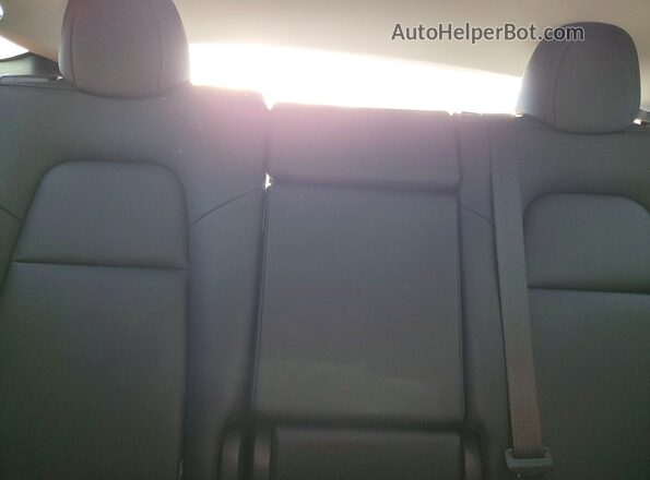 7SAYGDEE0RF198140 2024 TESLA MODEL Blue Vista de los asientos traseros