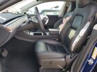 2024 Tesla Model Y Blue vin: 7SAYGDEE0RF198140