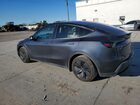 2026 Tesla Model Y Gray vin: 7SAYGDEE0TF390830