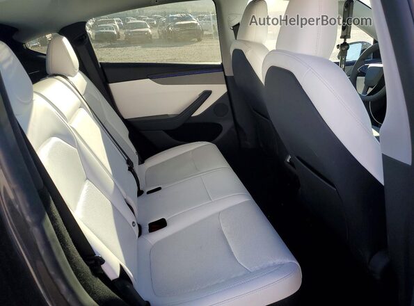 7SAYGDEE0TF390830 2026 TESLA MODEL Gray Սալոնի հետևի տեսք