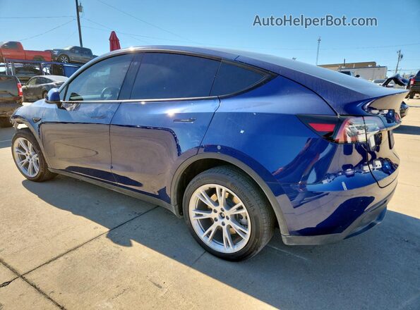 7SAYGDEE1PA080284 2023 TESLA MODEL Blue Trasero izquierdo