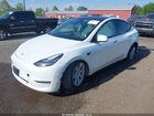 2023 Tesla Model Y   White vin: 7SAYGDEE1PA090071