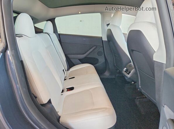 7SAYGDEE1PA154822 2023 TESLA MODEL Серый Вид задней части салона
