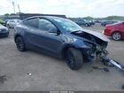 2023 Tesla Model Y Awd/long Range Dual Motor All-wheel Drive Gray vin: 7SAYGDEE1PF862071