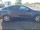 2023 Tesla Model Y Awd/long Range Dual Motor All-wheel Drive Gray vin: 7SAYGDEE1PF884457