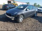 2023 Tesla Model Y Awd/long Range Dual Motor All-wheel Drive Gray vin: 7SAYGDEE1PF884457