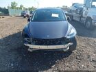 2023 Tesla Model Y Awd/long Range Dual Motor All-wheel Drive Gray vin: 7SAYGDEE1PF884457
