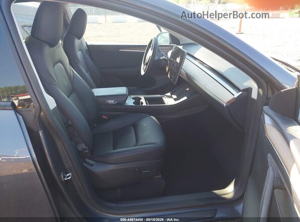 7SAYGDEE1PF884457 2023 TESLA MODEL Y Gray Вид салону спереду