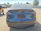 2024 Tesla Model Y Gray vin: 7SAYGDEE1RA222684