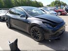 2024 Tesla Model Y Long Range Dual Motor All-wheel Drive Gray vin: 7SAYGDEE1RA255961