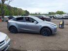 2024 Tesla Model Y Long Range Dual Motor All-wheel Drive Gray vin: 7SAYGDEE1RA316497