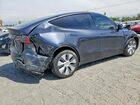 2024 Tesla Model Y Charcoal vin: 7SAYGDEE1RF079965