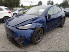 2024 Tesla Model Y Long Range Dual Motor All-wheel Drive Blue vin: 7SAYGDEE1RF150596
