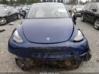 2024 Tesla Model Y Long Range Dual Motor All-wheel Drive Blue vin: 7SAYGDEE1RF150596