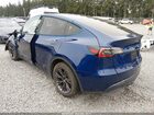 2024 Tesla Model Y Long Range Dual Motor All-wheel Drive Blue vin: 7SAYGDEE1RF150596
