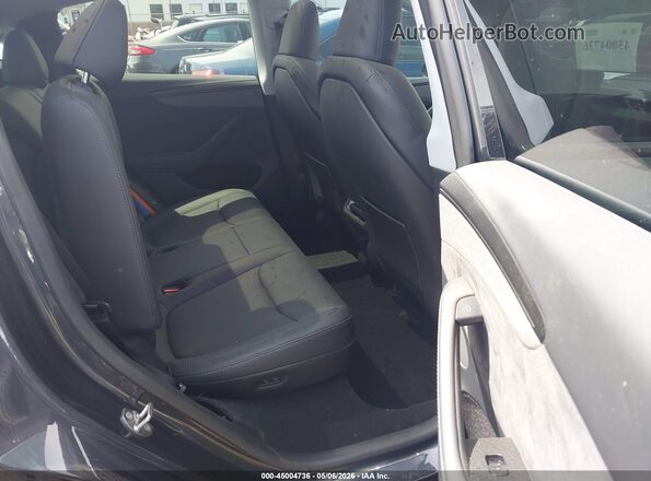7SAYGDEE1TA393913 2026 TESLA MODEL Y Gray VIN კოდის სტიკერის ხედი
