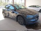 2026 Tesla Model Y All-wheel Drive/long Range Launch Series/premium All-wheel Drive Gray vin: 7SAYGDEE1TF563111