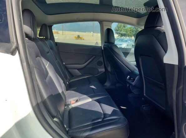 7SAYGDEE2NF323309 2022 TESLA MODEL White Rear seats view