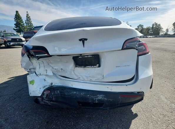 7SAYGDEE2NF323309 2022 TESLA MODEL White Rear view