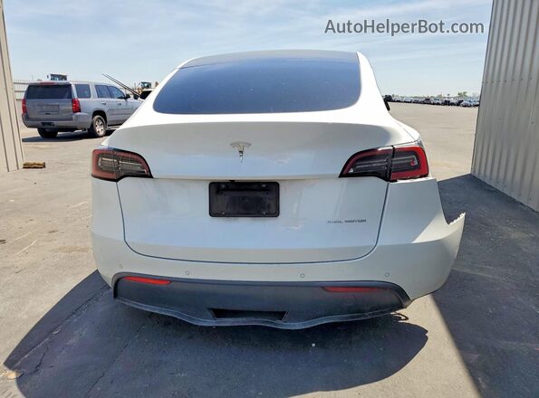 7SAYGDEE2NF348470 2022 TESLA MODEL White Հետևի տեսք