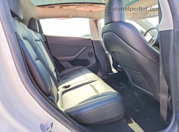 7SAYGDEE2PA150620 2023 TESLA MODEL White Rear seats view