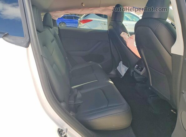 7SAYGDEE2PA194875 2023 TESLA MODEL White Vista de los asientos traseros