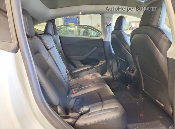 7SAYGDEE2PF584376 2023 TESLA MODEL White Rear interior view