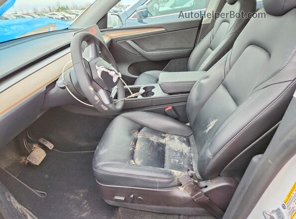 7SAYGDEE2PF584376 2023 TESLA MODEL White Front interior view