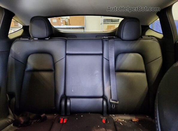 7SAYGDEE2PF584376 2023 TESLA MODEL White Rear seats view