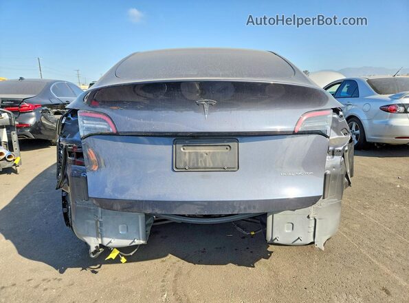 7SAYGDEE2PF743302 2023 TESLA MODEL Gray Rear view