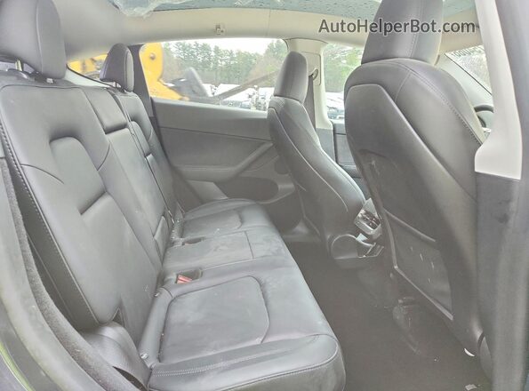 7SAYGDEE2PF863309 2023 TESLA MODEL Gray Rear seats view