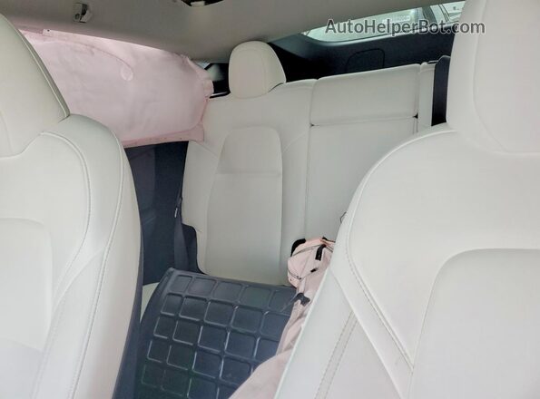 7SAYGDEE2PF909575 2023 TESLA MODEL Black Rear interior view