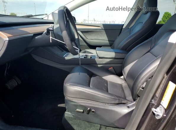 7SAYGDEE2RF130356 2024 TESLA MODEL Charcoal Vista interior delantera