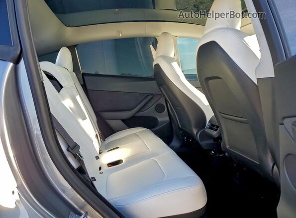 7SAYGDEE2SF279176 2025 TESLA MODEL Серый Вид задней части салона