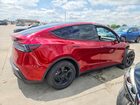 2026 Tesla Model Y Red vin: 7SAYGDEE2TA456551