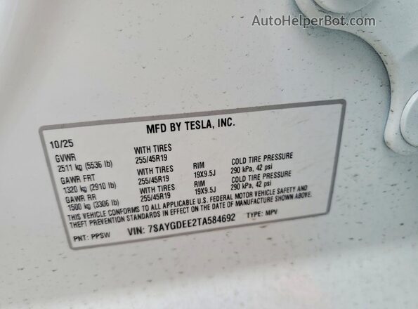 7SAYGDEE2TA584692 2026 TESLA MODEL White VIN կոդի պիտակի տեսք